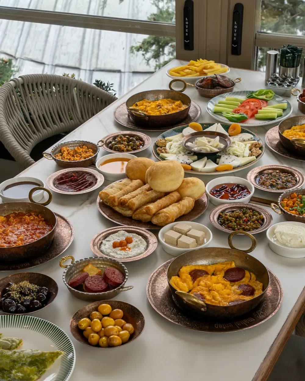 Gaziantep breakfast spread with sucuklu yumurta, menemen, cheeses, sigara böreği and pistachio katmer, Karaköy