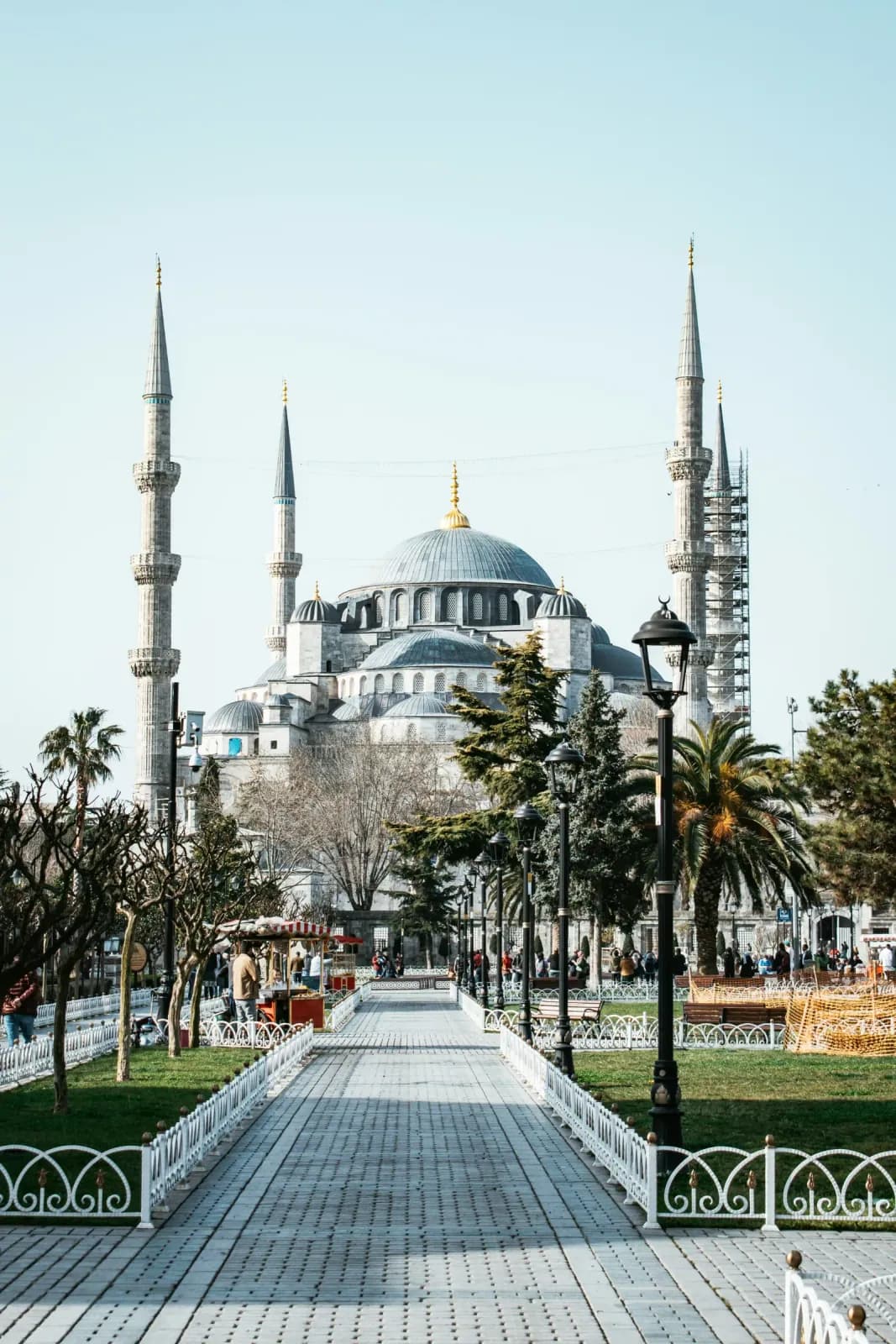 Interior view of the Blue Mosque featuring over 20,000 handmade Iznik tiles and intricate calligraphy.