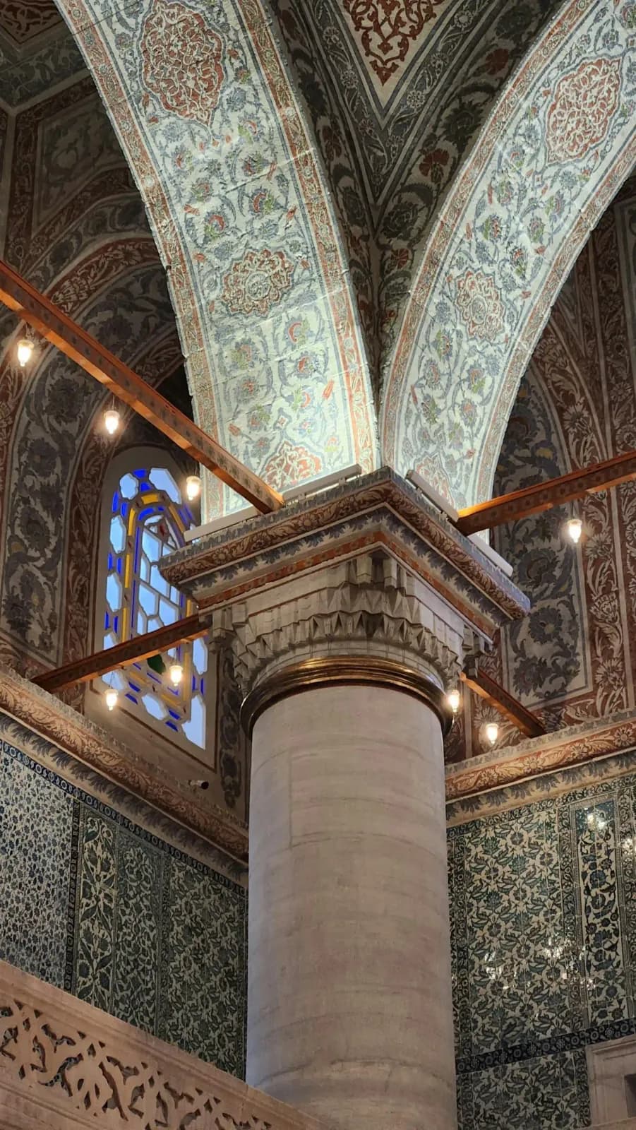 Close-up of the elegant marble columns and historic arches inside the Blue Mosque.
