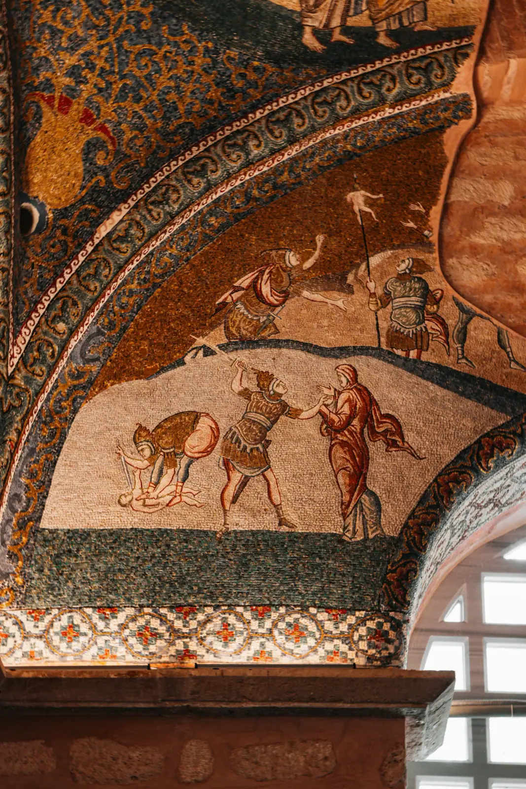 Looking up at the ornate central dome and its celestial frescoes in Kariye Mosque. Discover the mystical ambiance of Istanbul.