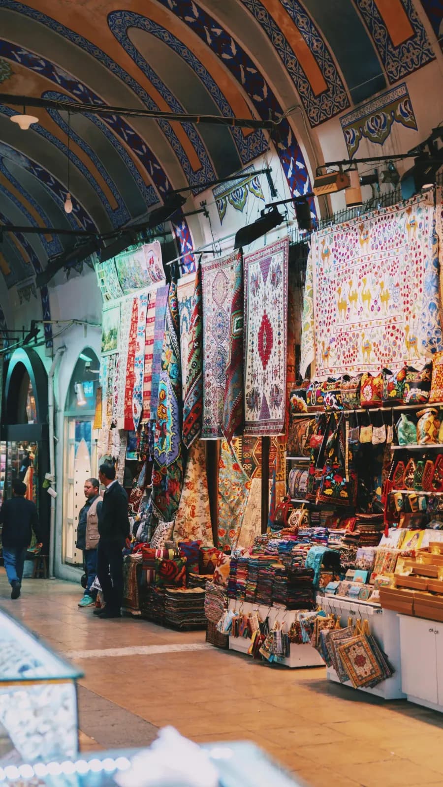 Vibrant streets of the Grand Bazaar filled with traditional Turkish lamps and crafts.