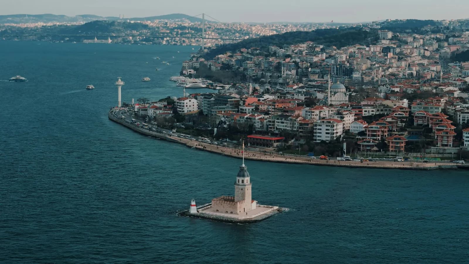 Maiden's Tower silhouette against the historic Istanbul skyline A unique Byzantine and Ottoman monument in the middle of the sea.