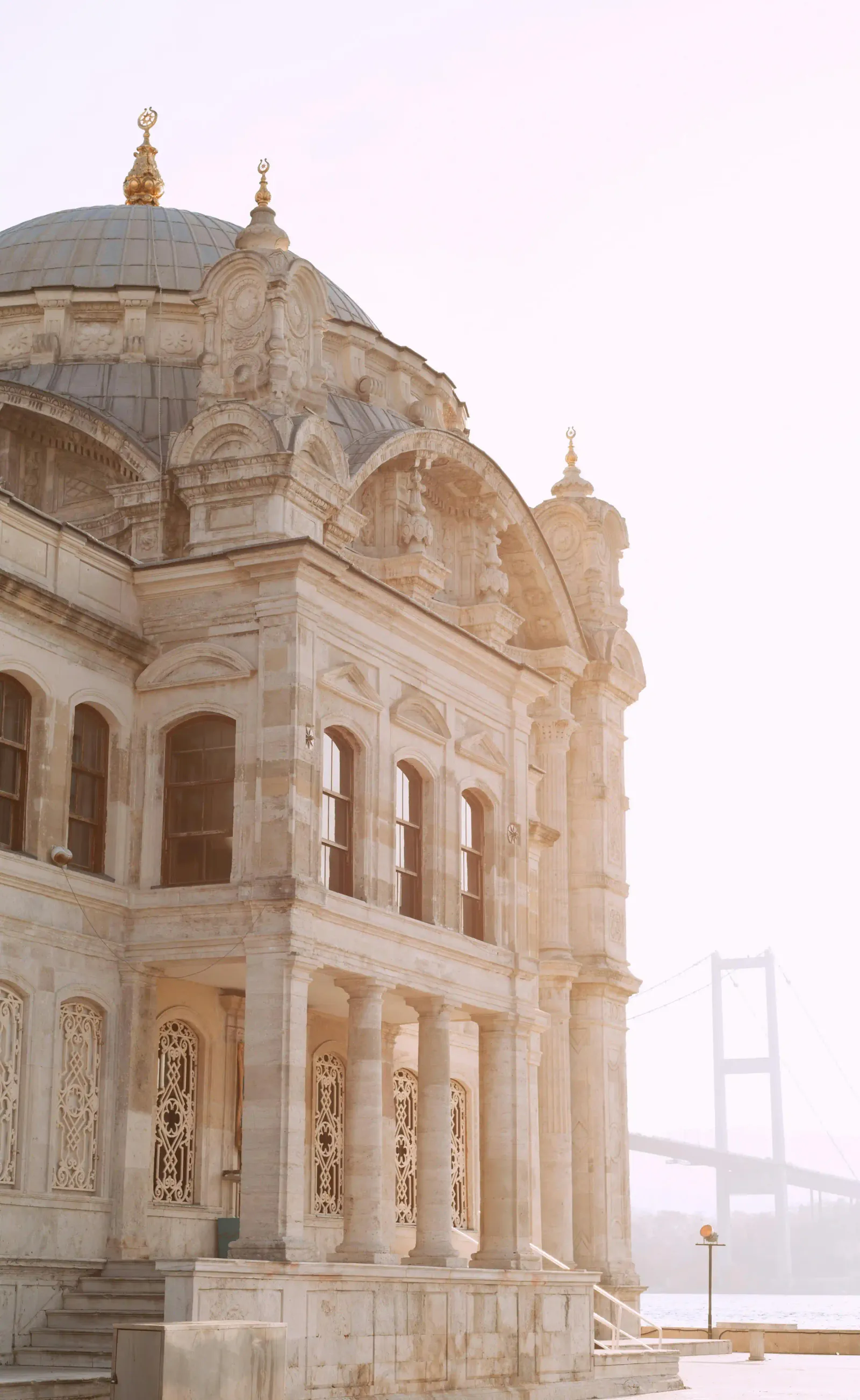 The serene atmosphere of Ortakoy Mosque during the golden hour.