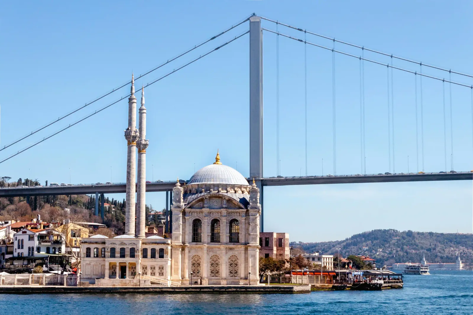 Stunning view of Ortakoy Mosque with the Bosphorus Bridge. Discover the perfect blend of history and modern Istanbul during your.