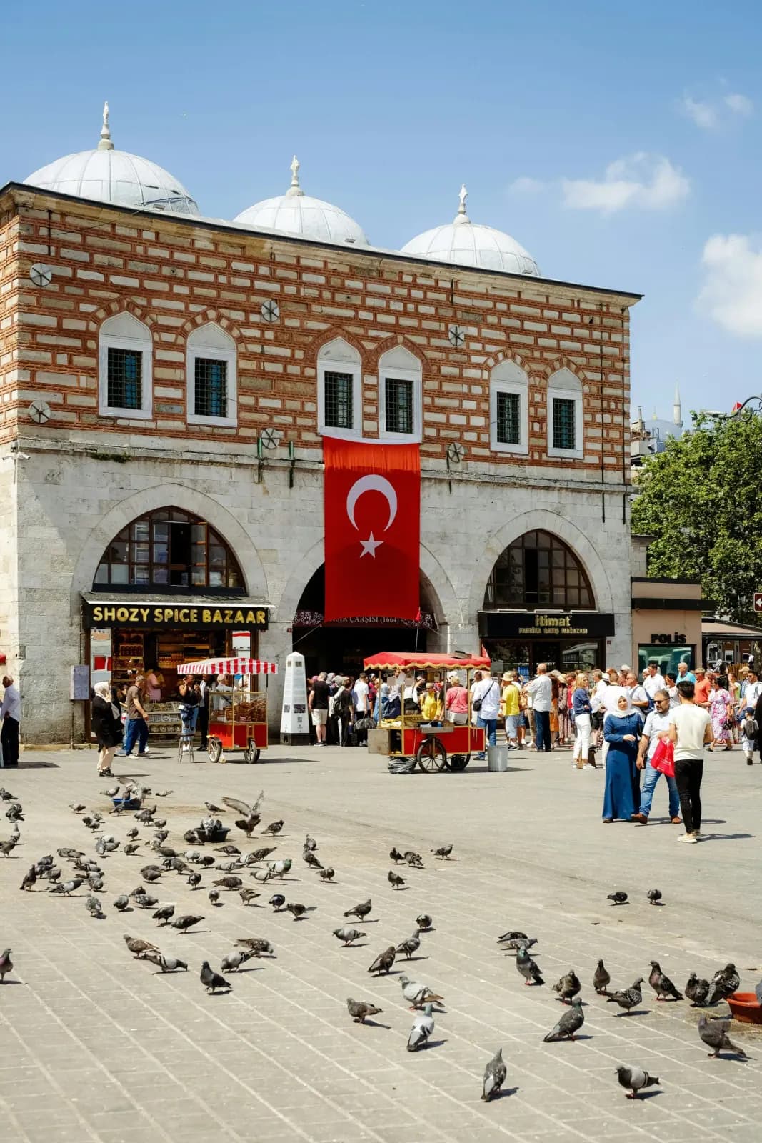 The historic 17th-century entrance of the Spice Bazaar (Misir Carsisi) in Eminonu. A vibrant landmark just a short trip.