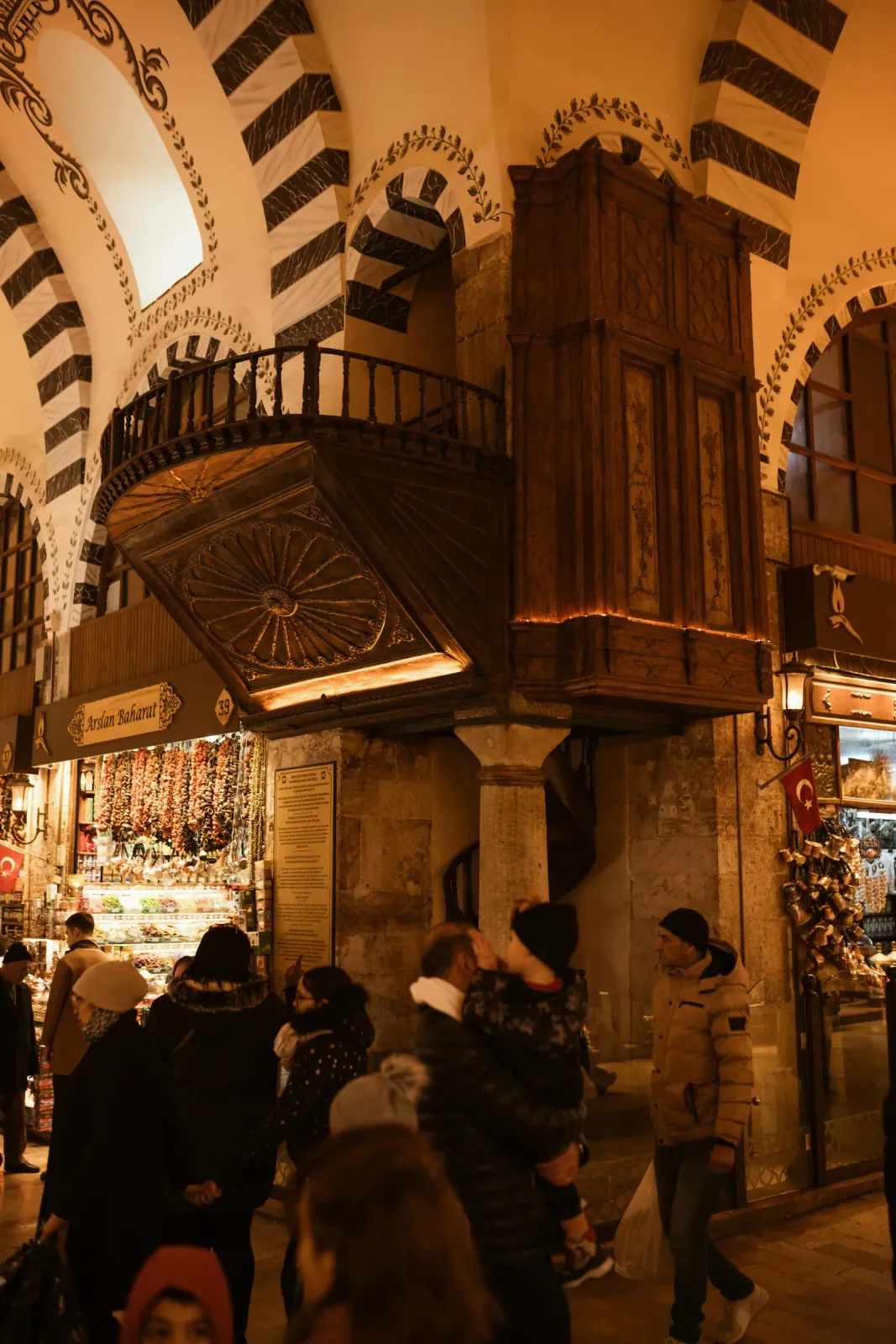 Detailed interior view of the L-shaped Spice Bazaar with its historic vaulted ceilings.