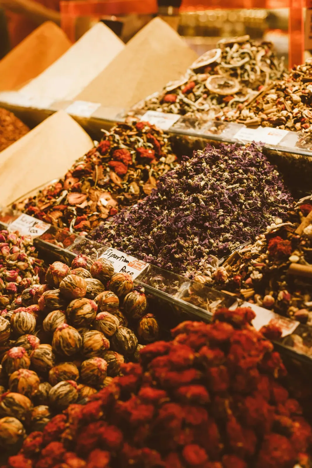 Colorful and aromatic spice displays at the historic Spice Bazaar in Istanbul. Discover the city's sensory treasures while.