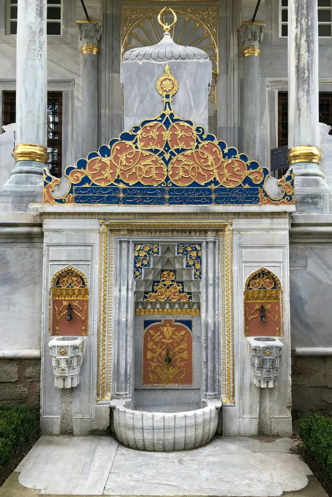 Ornate Ottoman fountain at the entrance of the Ahmed III Library in Topkapı Palace